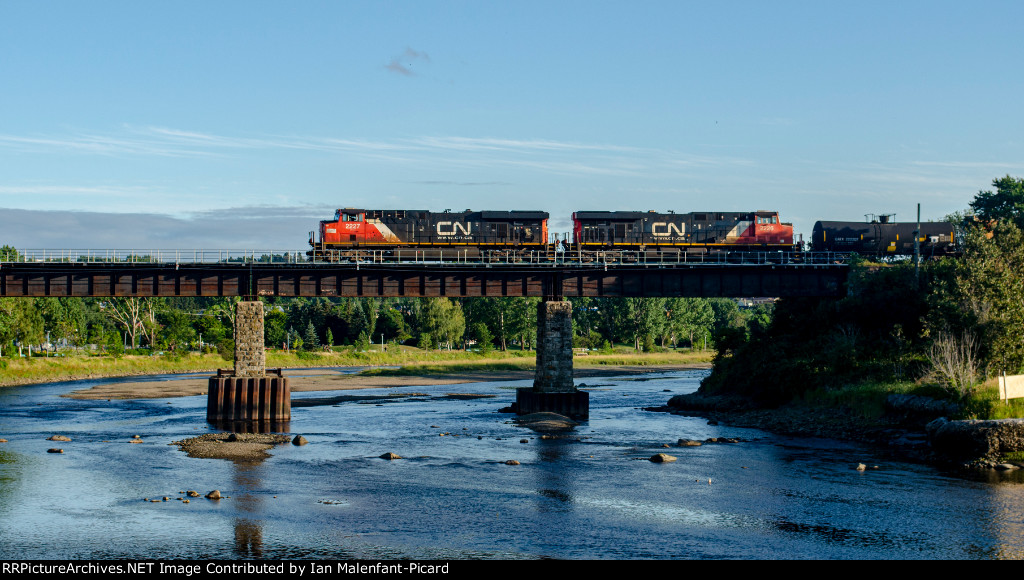 CN 2227 and 2226 leads 402 across the Rimouski river